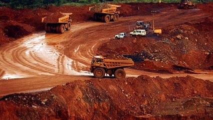 Open-pit mining operations with heavy machinery